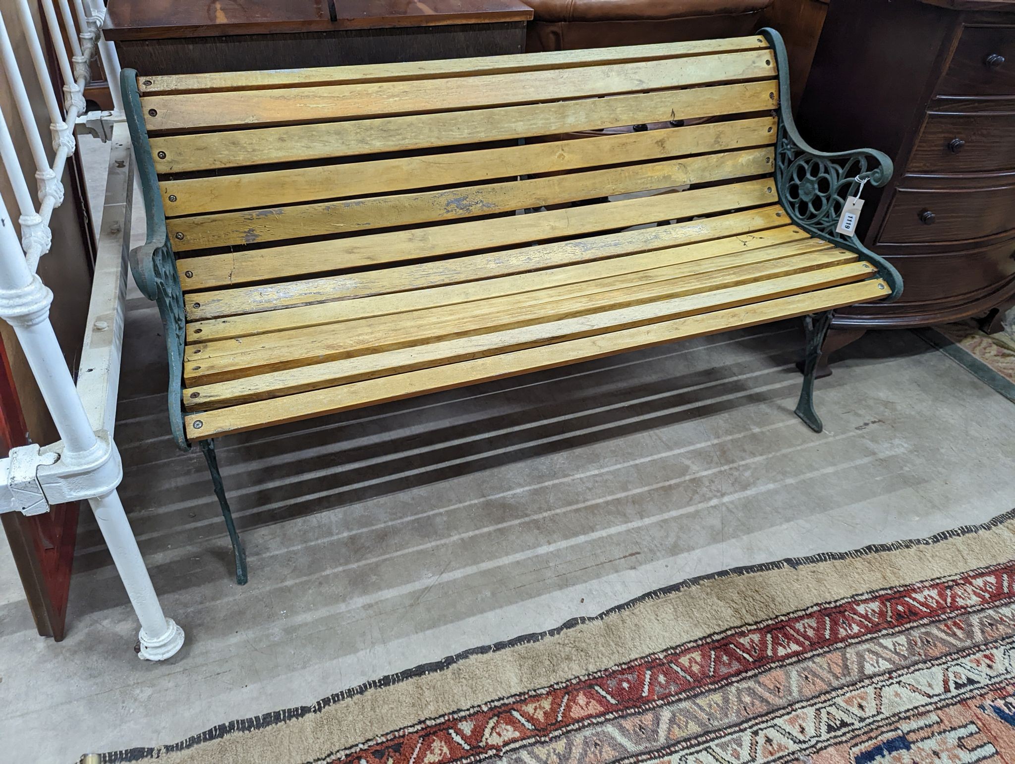 A Victorian style painted aluminium slatted garden bench, length 127cm, depth 60cm, height 70cm